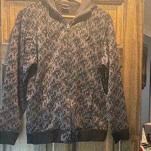 Under Armor Geometric Patterned Zip-Up Hoodie. Size small. Black and grey